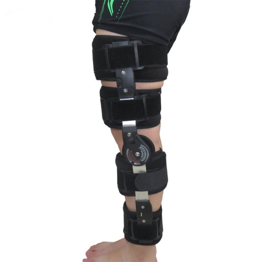 Black adjustable knee joint fixation brace with metal hinges and dial control