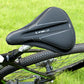 Black gel saddle cover mounted on a bicycle seat for padded, cushioned comfort