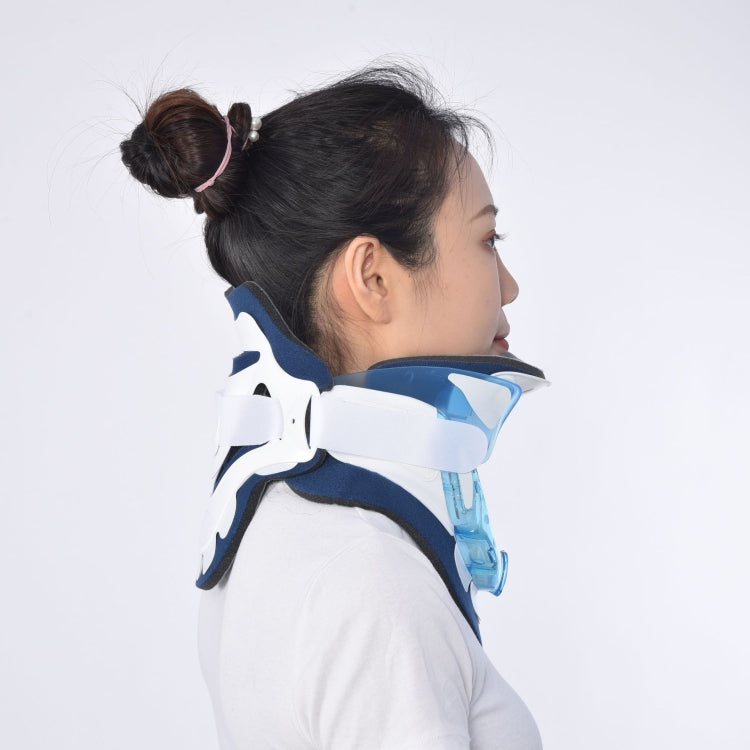 Side view of plastic neck brace on person; navy strap with white shell and light-blue element