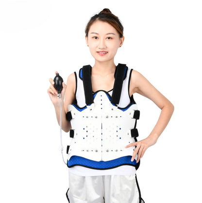 Adjustable thoracolumbar fixation brace with white panel, black straps, and blue trim