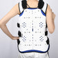 Thoracolumbar fixation brace front view with white shell, dotted backing, and black fastening blocks