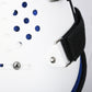Close-up of thoracolumbar brace fastener: silver grommet on white panel with blue dots