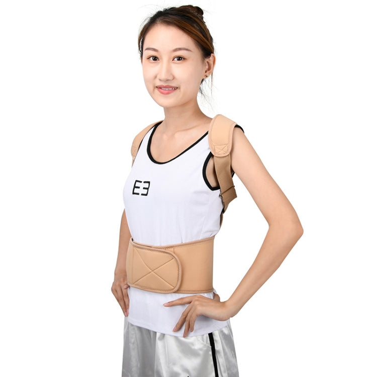 White shirt wearing tan-and-black posture correction back brace with shoulder strap support