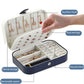 Open double-layer jewelry box with necklace hooks, stud earring slots, and ring sections