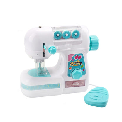 White and turquoise toy electric sewing machine with transparent needle area and foot pedal