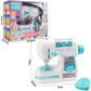 Toy electric sewing machine in retail box, white body with turquoise bobbins and accessories