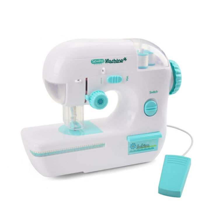 White toy electric sewing machine with turquoise control buttons and visible needle stand