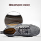 Gray lace-up sneaker interior showing breathable lining and perforated insole