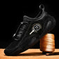 Black leather lace-up sneakers with textured toe and cushioned ankle collar.