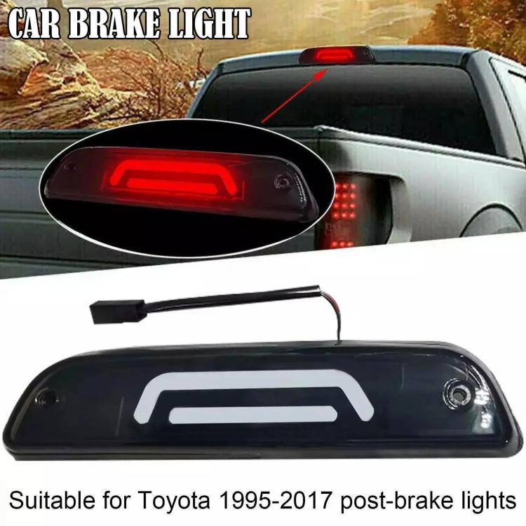 High-mounted brake light with red LED strip glowing in black housing
