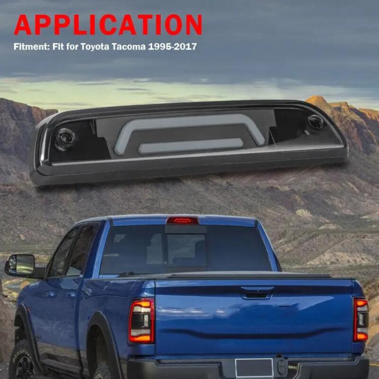 Installed high-mounted brake light on rear of pickup truck, black housing