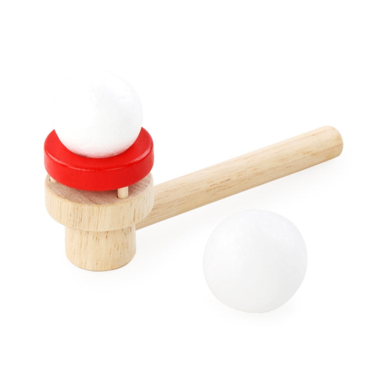 Wooden ball blower toy with long handle, red ring base, and white foam balls
