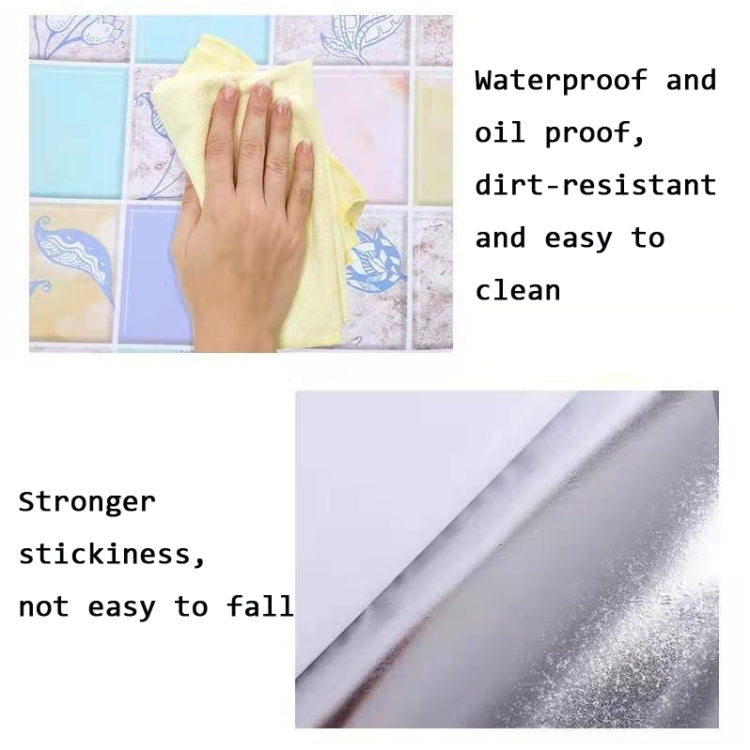 Kitchen anti-smoke tile wall sticker sheet being wiped clean on a pastel backsplash