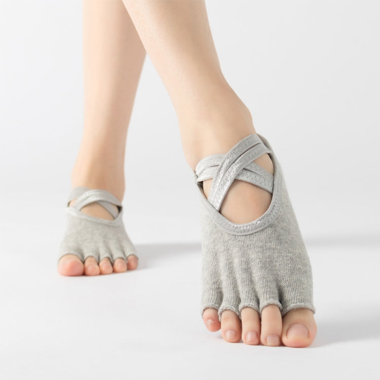 Light gray five-finger socks with crisscross strap at the top of the toes