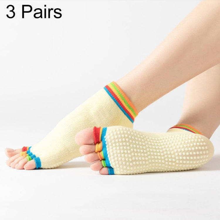 Light yellow open-toe five-finger yoga socks with dotted anti-slip soles and rainbow cuffs