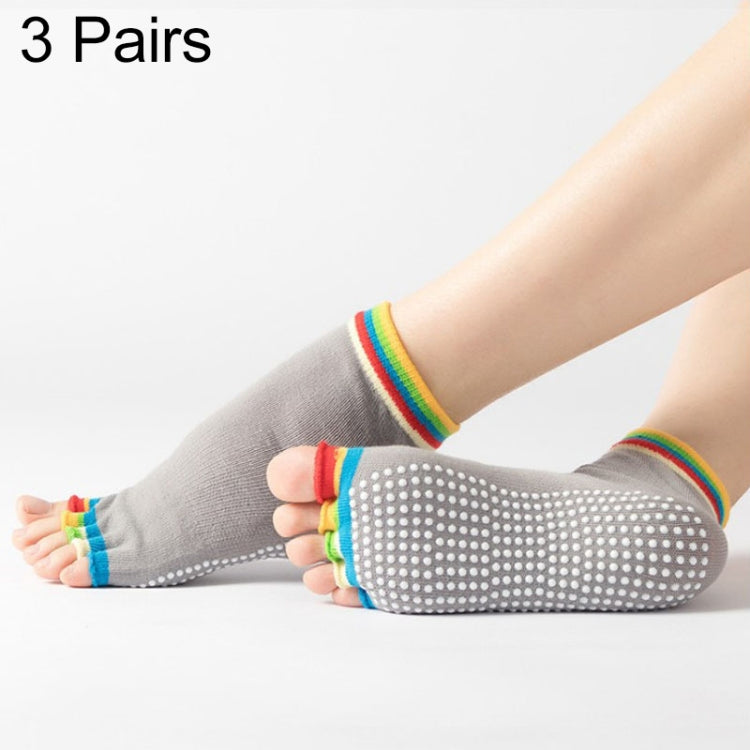 Gray open-toe five-finger yoga socks with dotted anti-slip soles and rainbow cuffs