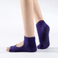Purple two-toe yoga socks with textured non-slip sole for grip