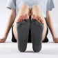 Dark gray two-toe yoga socks with textured non-slip sole, open-toe clog style