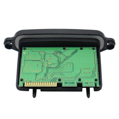 LED headlight controller module with green circuit board and black protective housing