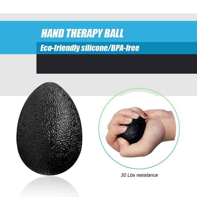 Black therapy ball with textured surface for hand squeezing resistance training