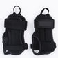 Pair of black padded palm guards with hook-and-loop wrist closures, roller skate style