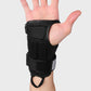 Black roller skating palm guard on open hand with adjustable wrist strap