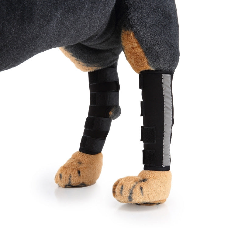 Dog knee pads in dark fabric with black straps and gray trim