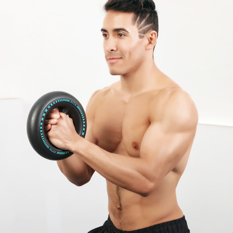 Black electronic wrist power ball with blue LED rim, held in a hand