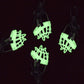 Fluorescent dog muzzle cover with glowing green plastic cage and black strap hardware