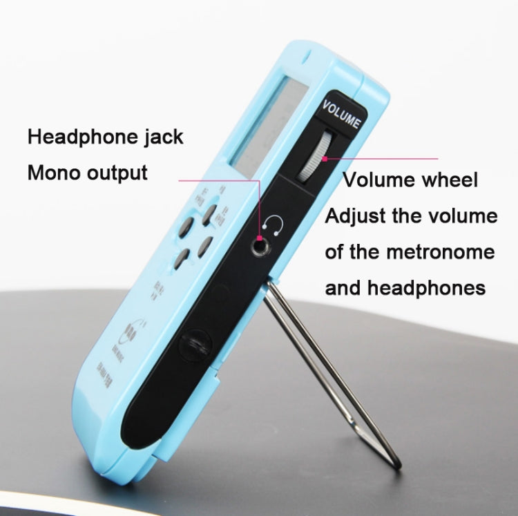 Light blue electronic metronome showing volume wheel and headphone jack