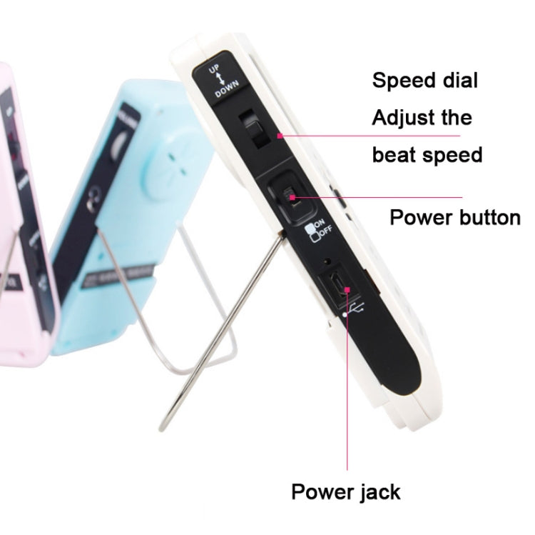 White electronic metronome side view with speed dial and power jack