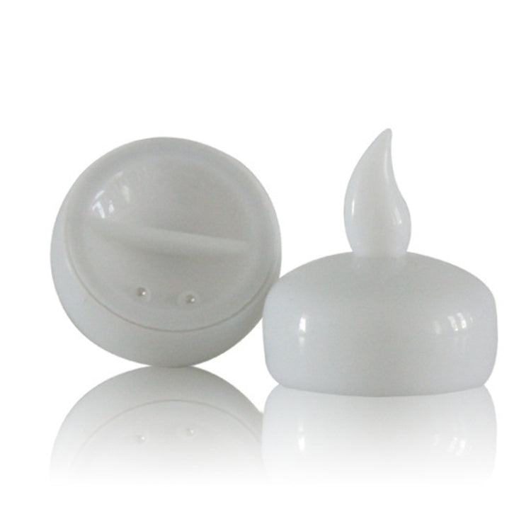White LED floating candle with flame-shaped top, shown from side