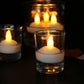 Warm white LED candle flame glow inside a clear glass holder