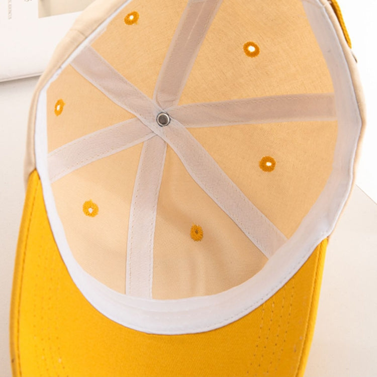 Kids baseball cap interior top view with striped lining and small yellow eyelets
