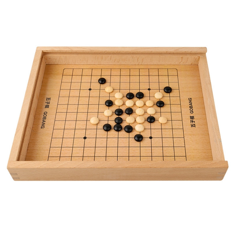 Wooden grid strategy game board with black and white round discs and star-point lines
