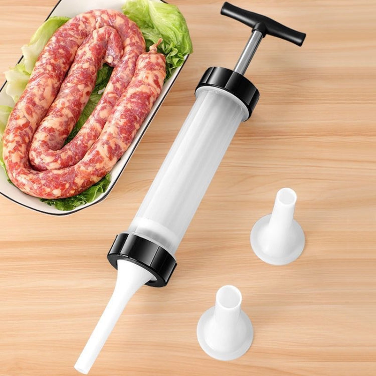 Small manual sausage stuffer with white barrel, push rod, and stuffing nozzles