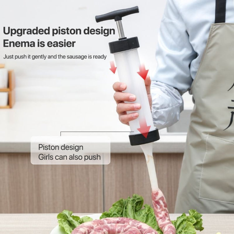 Manual sausage stuffer held upright, with piston-style push rod and casing filling