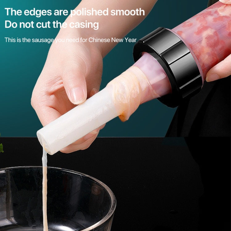 Sausage stuffer nozzle with black ring fitting a white casing for filling