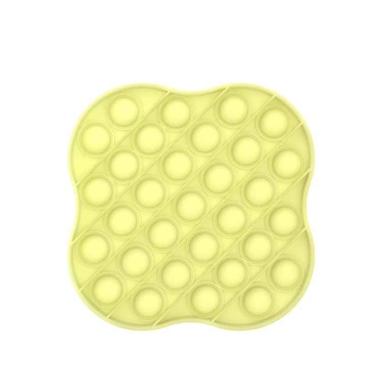 Yellow silicone pressing pop-it board with circular bubbles