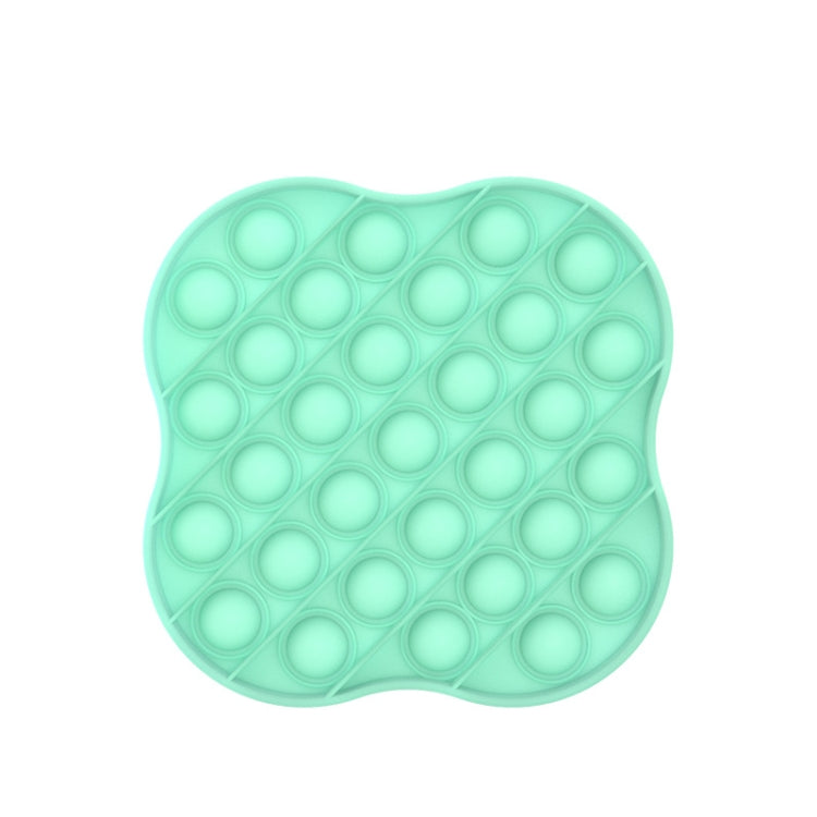 Green silicone pressing pop-it board with circular bubbles