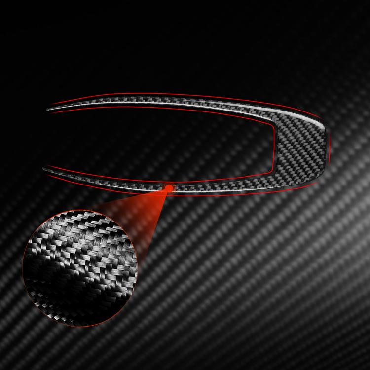 Red carbon-fiber gear shift panel trim sticker with textured circle detail