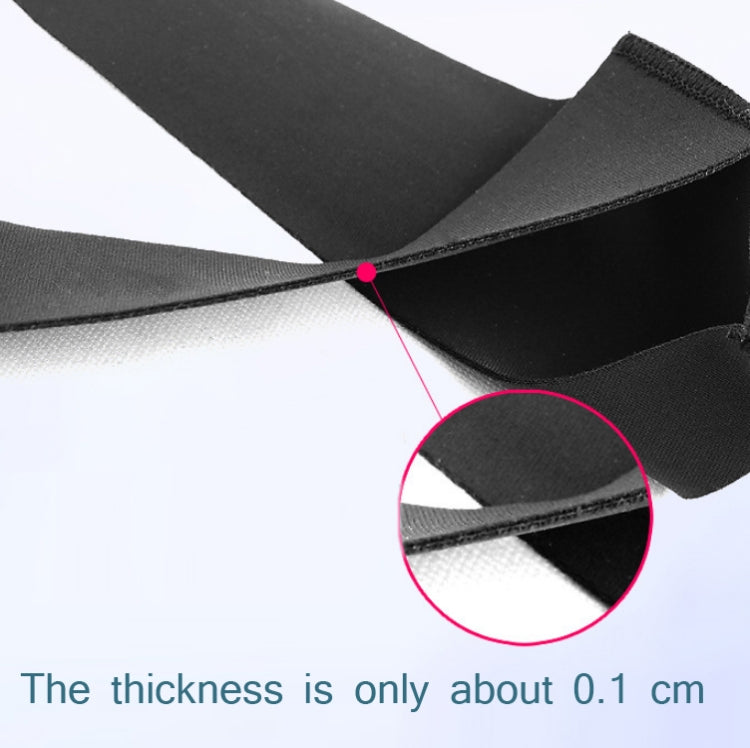 Close-up of thin black wrist brace with thumb cover and slim felt insert.