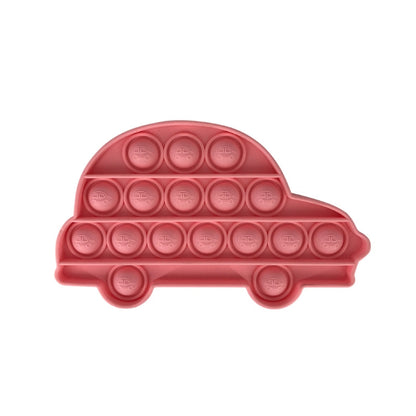 Red silicone car-shaped pop-it board with circular press buttons for kids