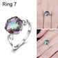 Sterling silver ring with large multicolor faceted gemstone and twisted band accents