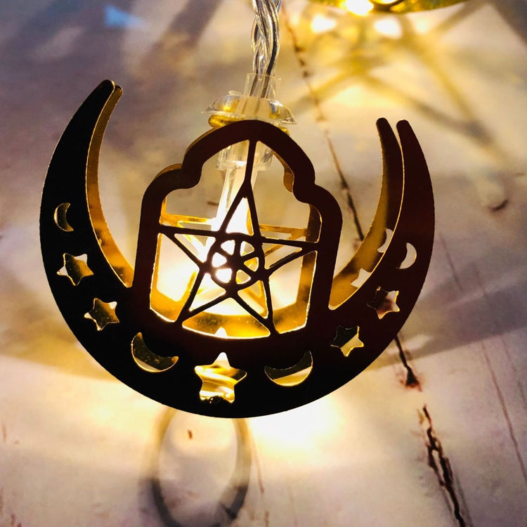 Crescent and star lantern LED light with warm white glow on the string.