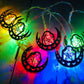 Colorful crescent and star lantern LED lights on a multicolor glowing string.