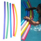 Assorted foam swimming sticks in multiple colors, bundled and held by a swimmer