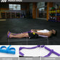 Purple pedal puller with thick elastic hose and reinforced handle loop detail