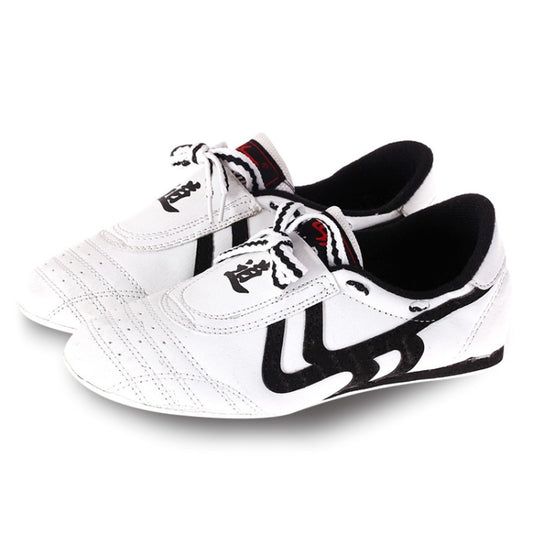 White taekwondo training shoes with black swoosh and red/black strap, lace-up pair