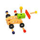 Colorful wooden toy cart with bolts, screws, and hammer pieces